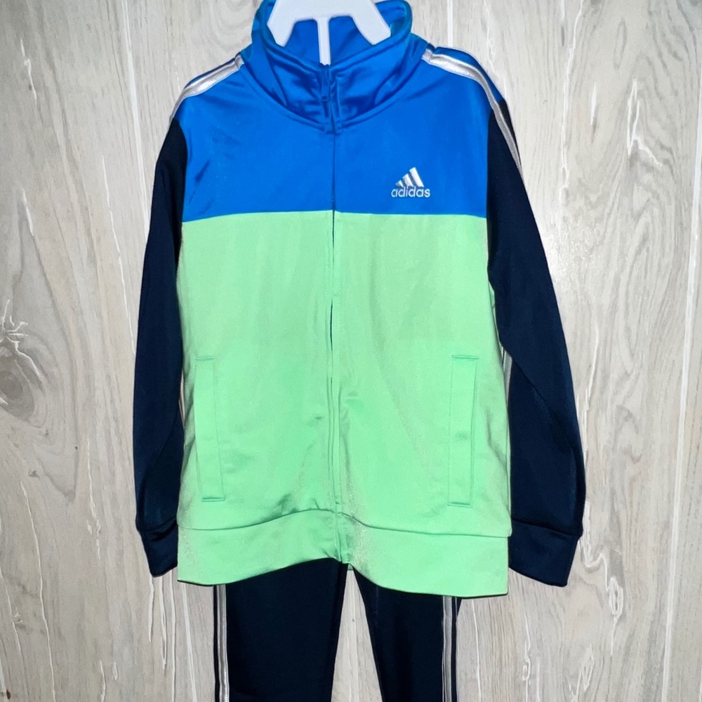 Adidas Track Suit. Size Kid 5.  Full zip jacket, long pants.